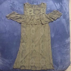 Cute olive green mini dress that has cutout shoulders.